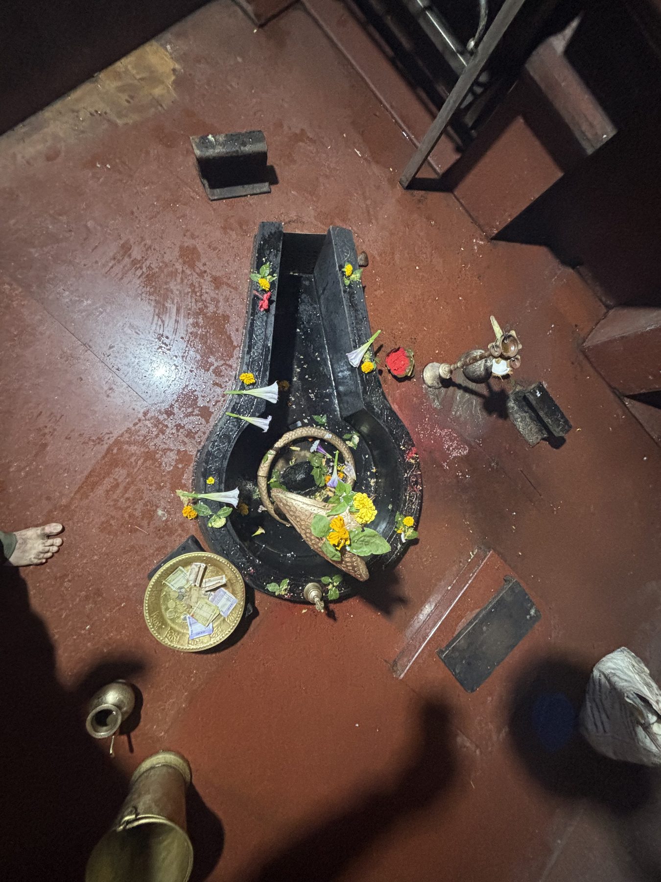 The Shiva linga with offerings